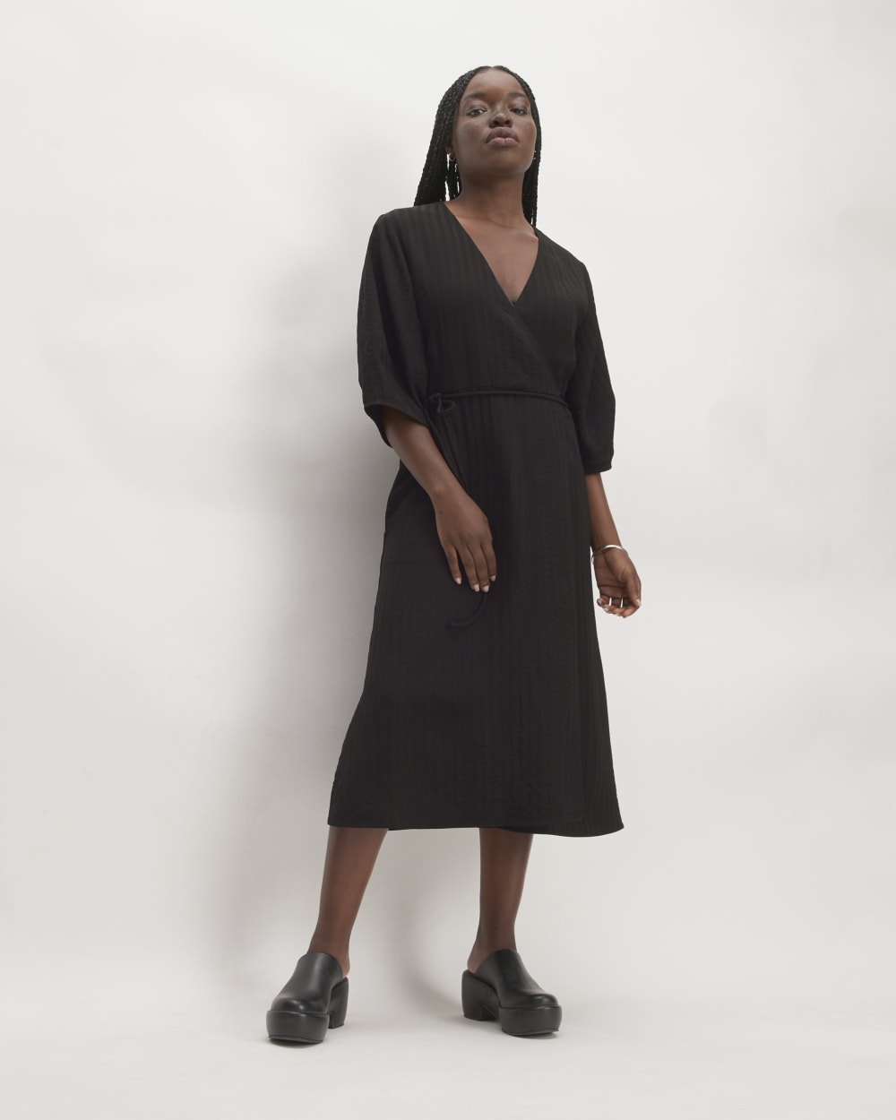 The City Stripe Wrap Dress in Black — front view