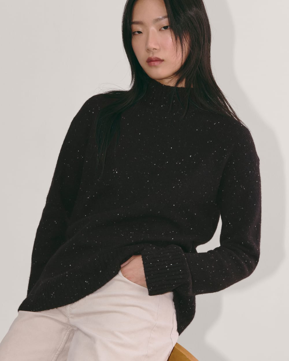 The Mockneck Sweater in Plush Cotton in Black Confetti — detail view