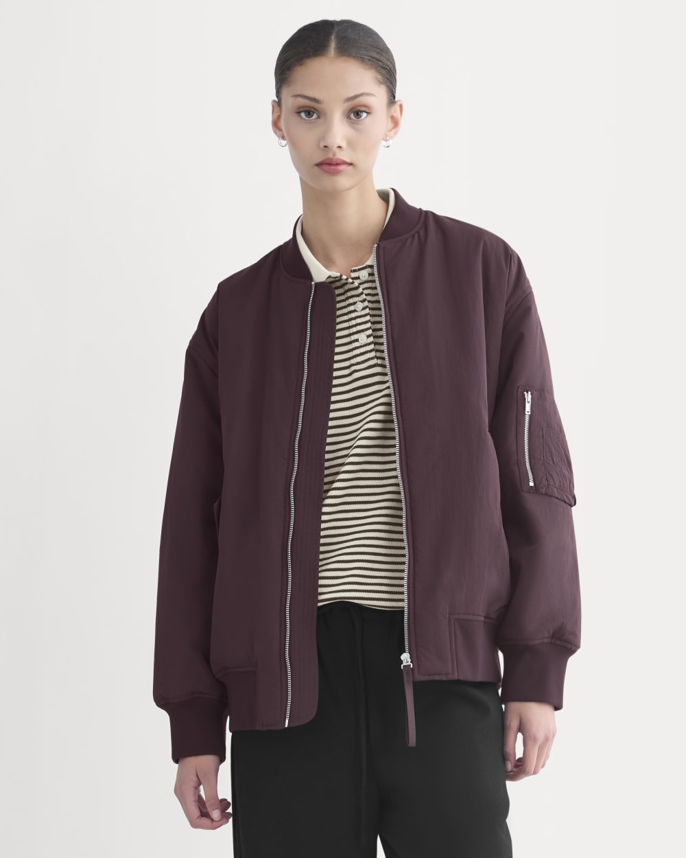 Renew Oversized Puffer Bomber in Deep Plum — front view