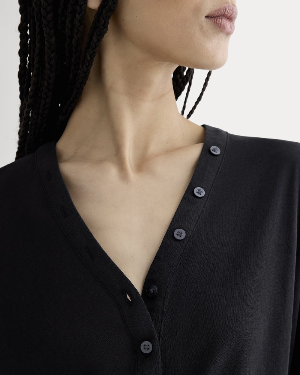 The Air V-Neck Henley in Black — detail view
