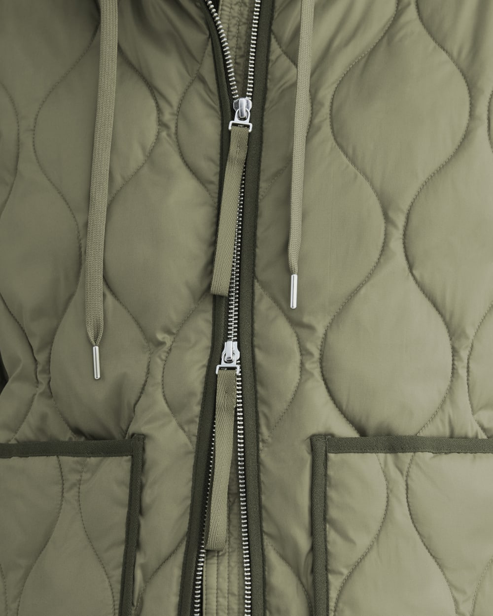 ReNew Quilted Hooded Liner in Lichen Green — detail view