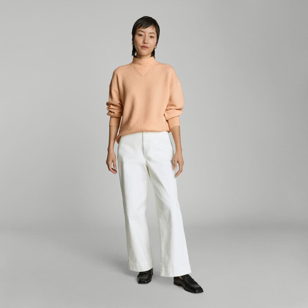 The Cozy-Stretch Pullover in Apricot — detail view