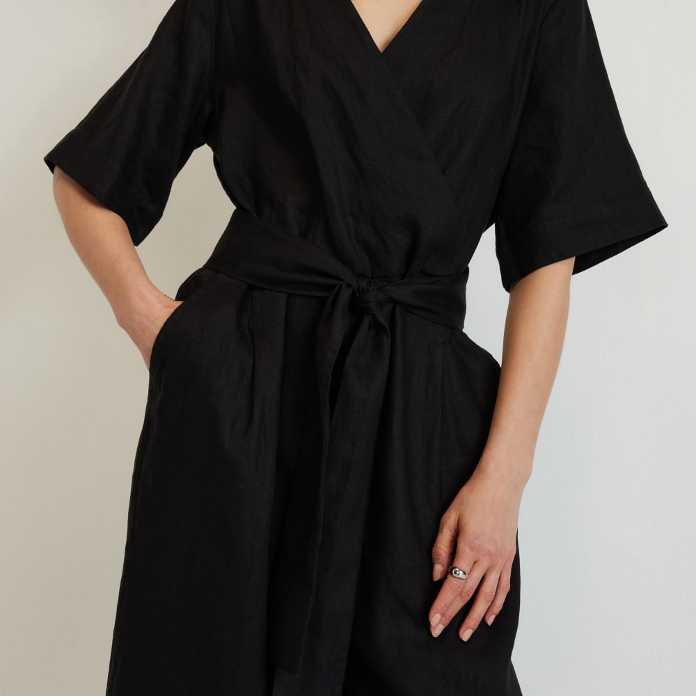 The Wrap Jumpsuit in Linen in Black — detail view