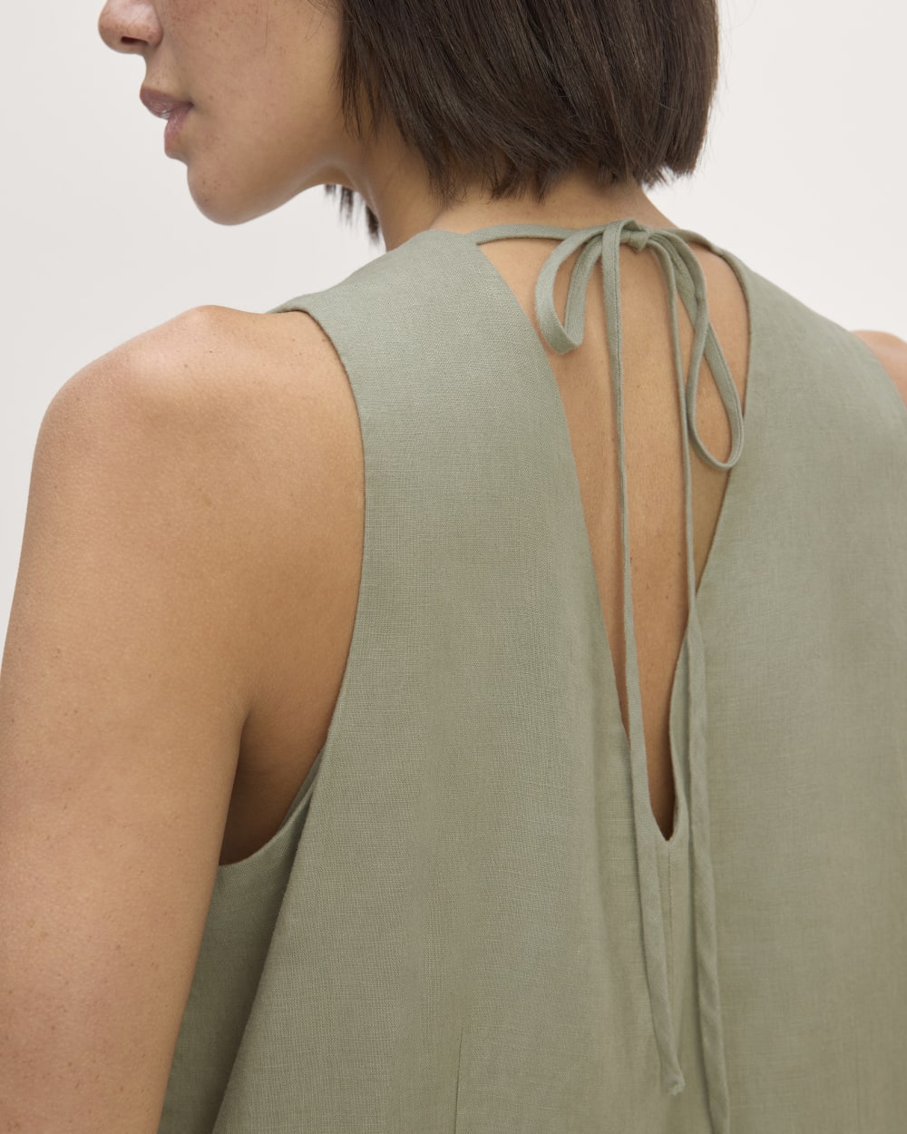 The Linen V-Neck Maxi Dress in Sage Green — detail view