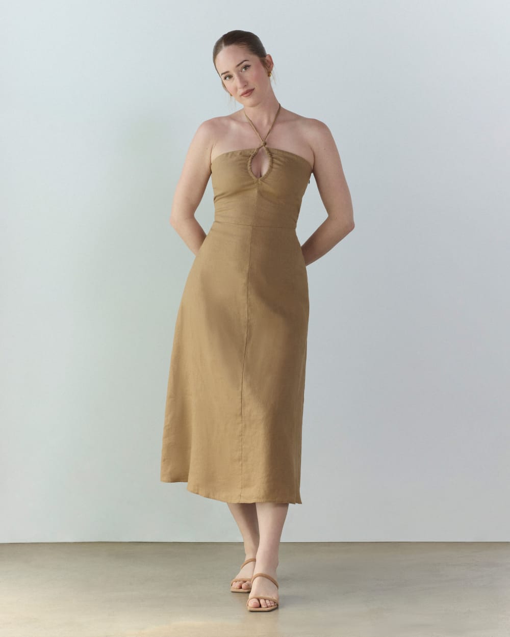 The Linen Halter-Neck Dress in Tiger's Eye — detail view