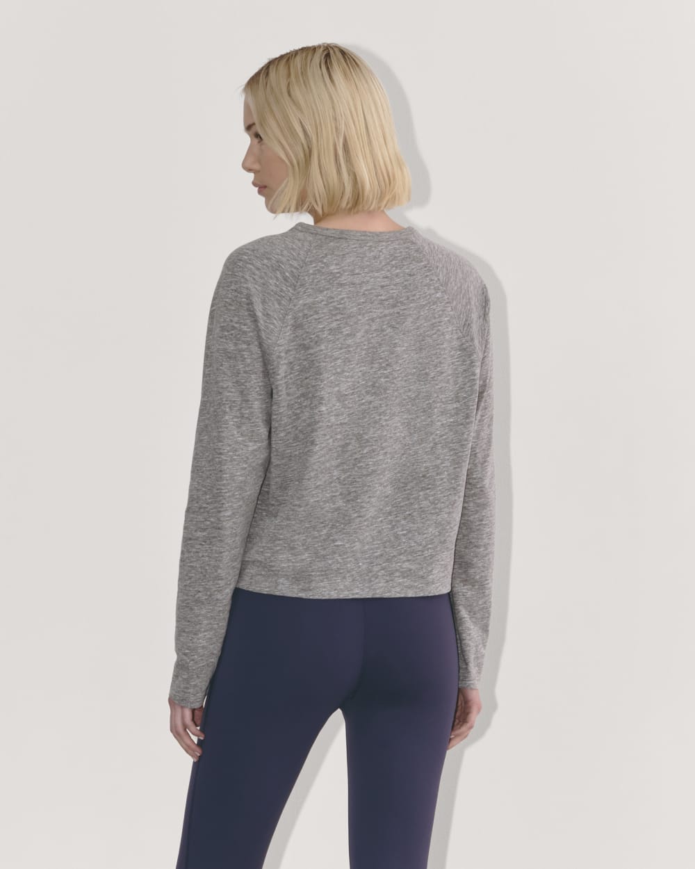 The Perform Crew Tee in Heathered Grey — detail view