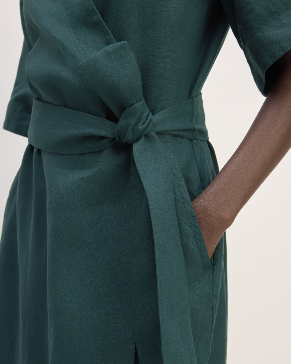 The Wrap Dress in Linen in Dark Sea — detail view