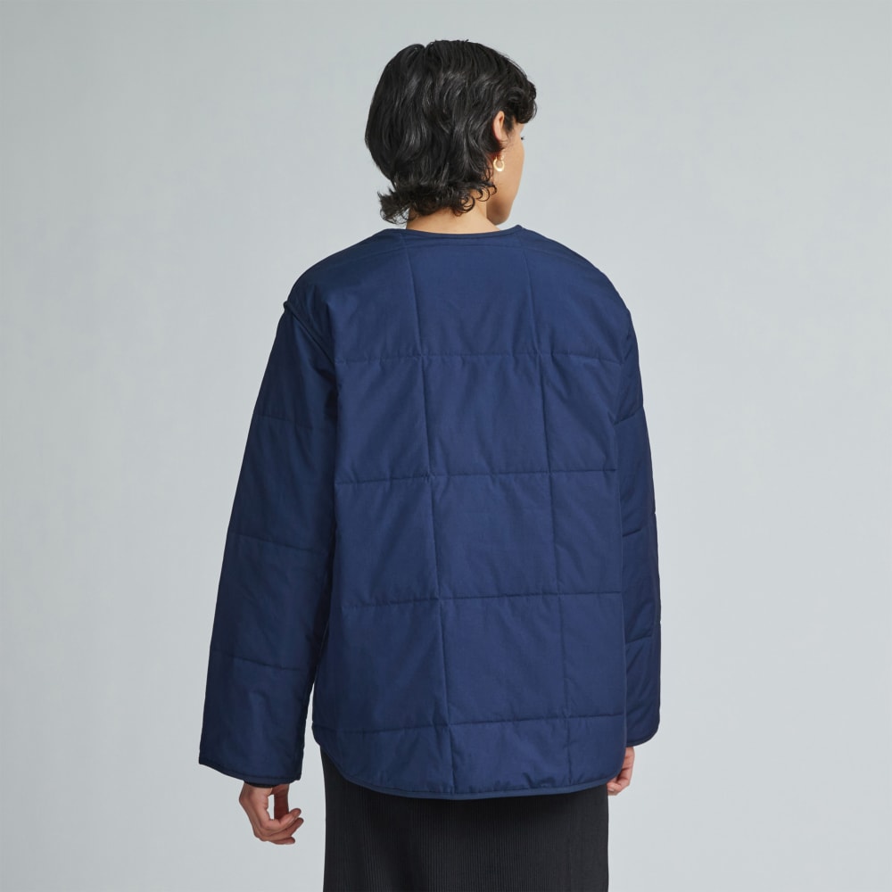 The Quilted Cotton Liner in Navy — detail view