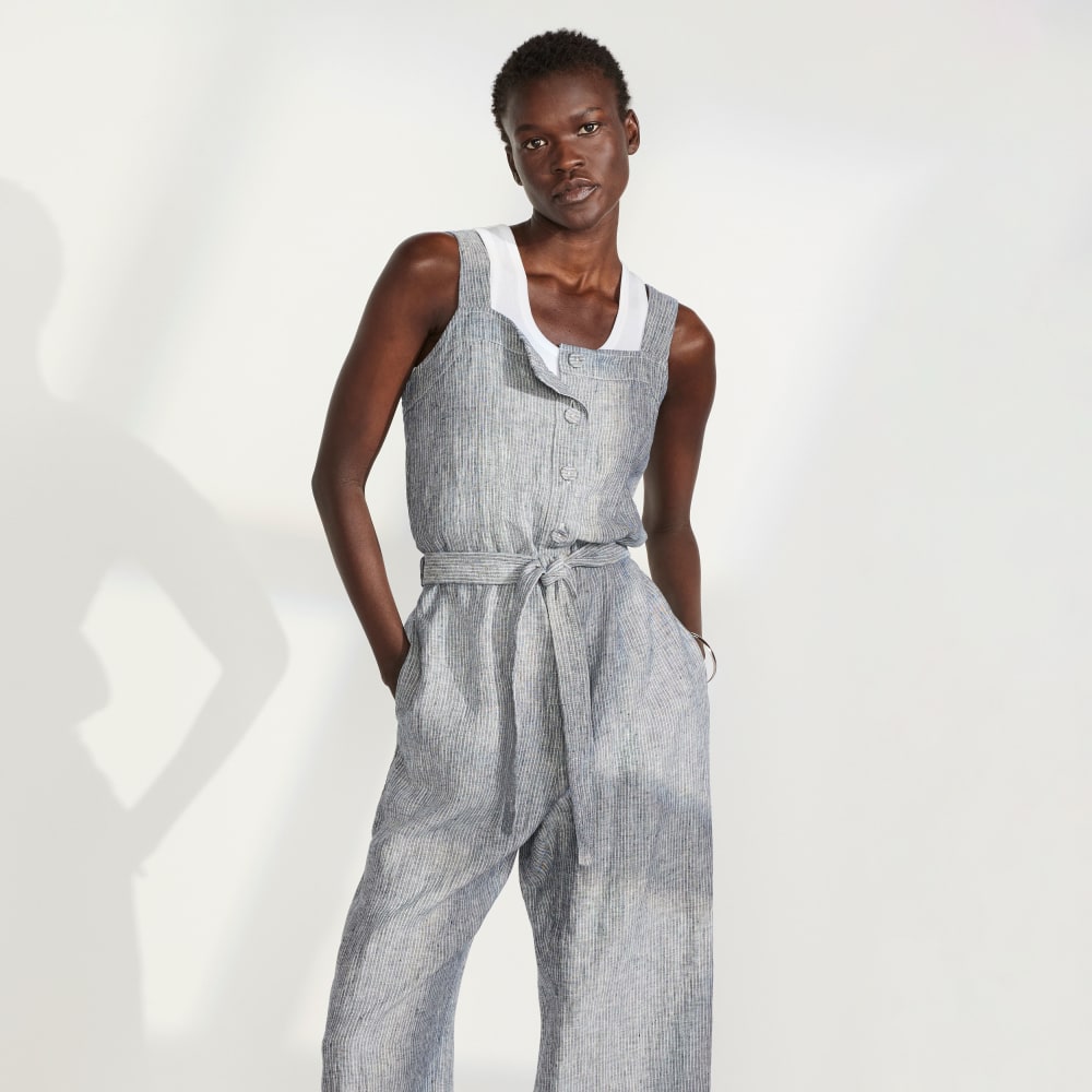 The Linen Jumpsuit in Canvas Tan / Navy — detail view