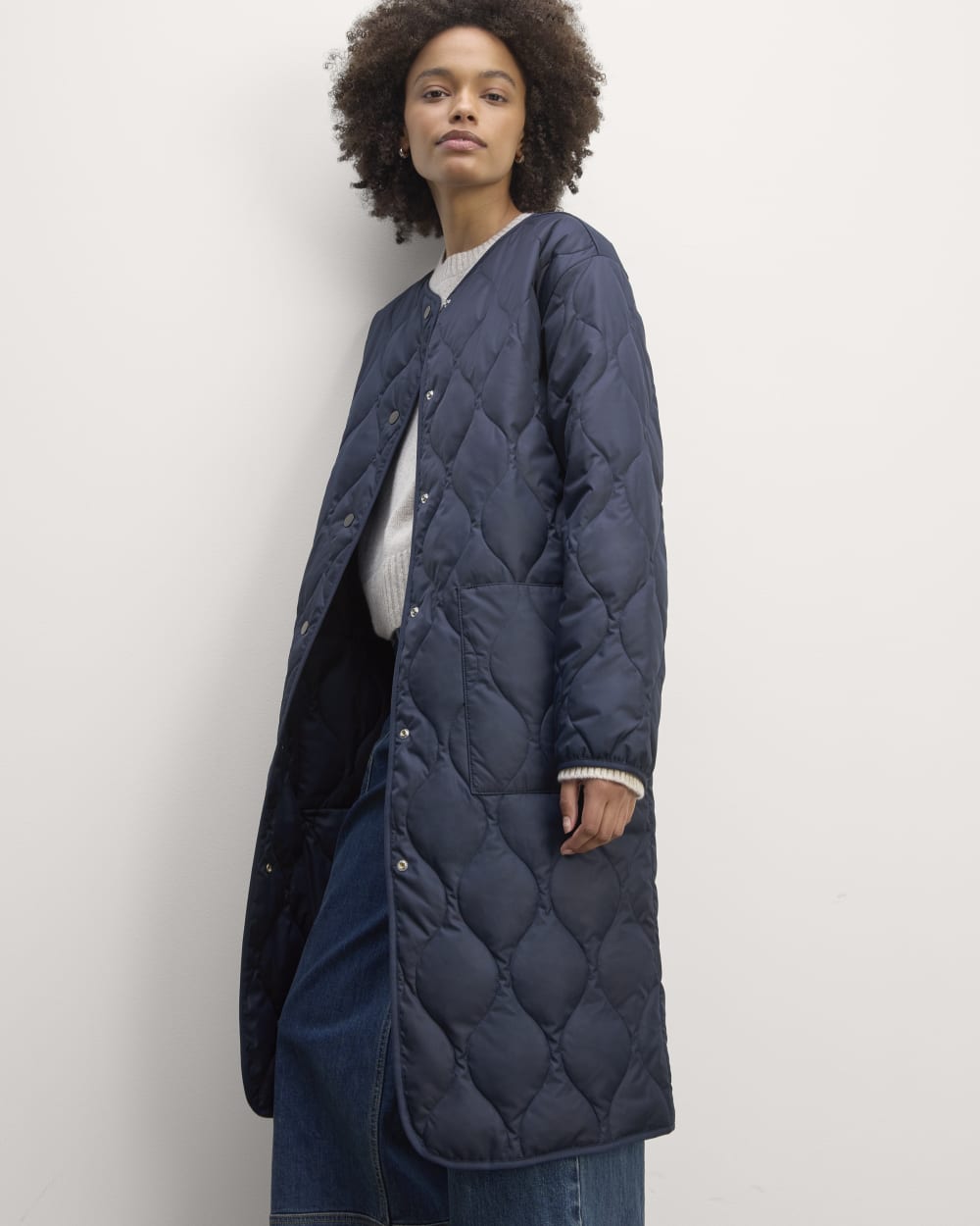 The Long Quilted Liner in Navy — front view
