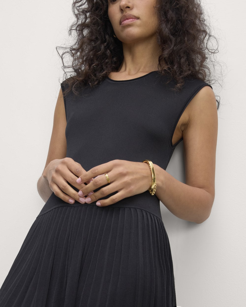 The Knit Pleated Dress in Black — detail view