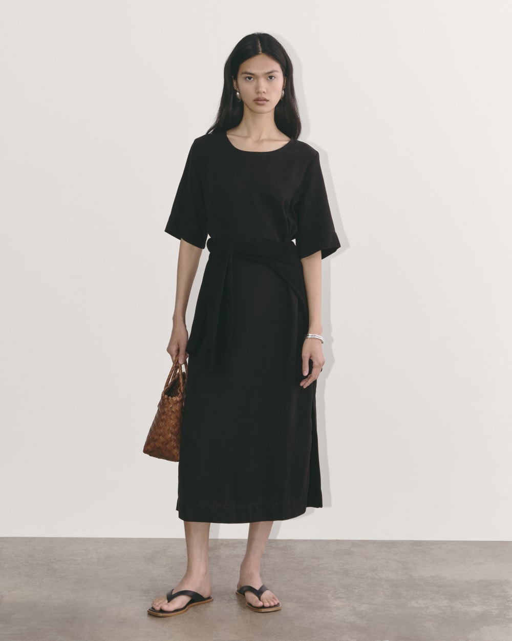 The Relaxed T-Shirt Dress in Buttersoft in Black — front view