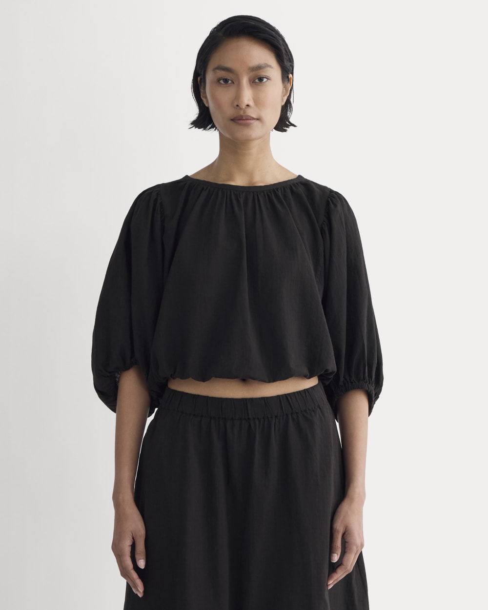 The Gauze Puff-Sleeve Top in Black — front view