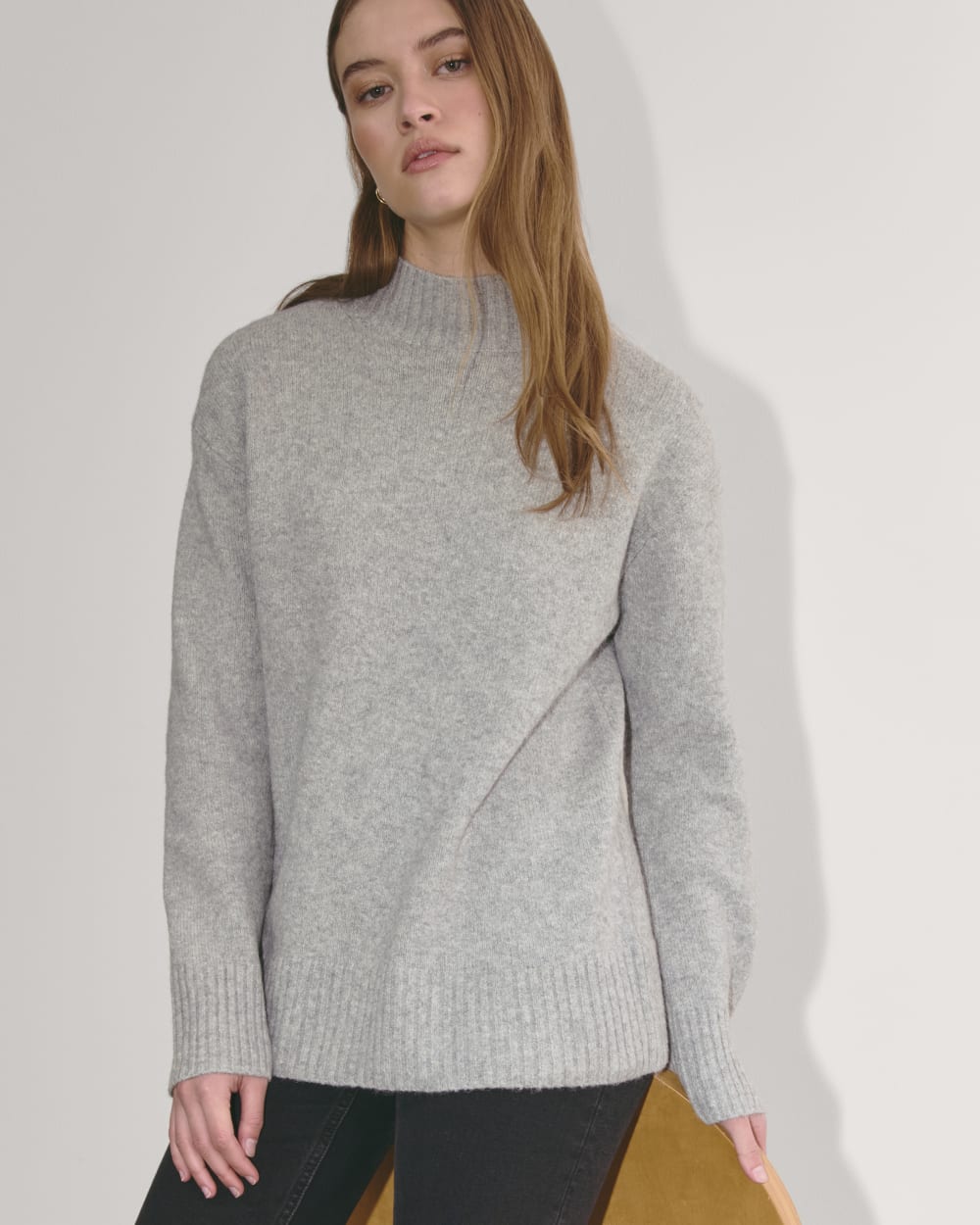 The Mockneck Sweater in Plush Cotton in Heathered Grey — detail view