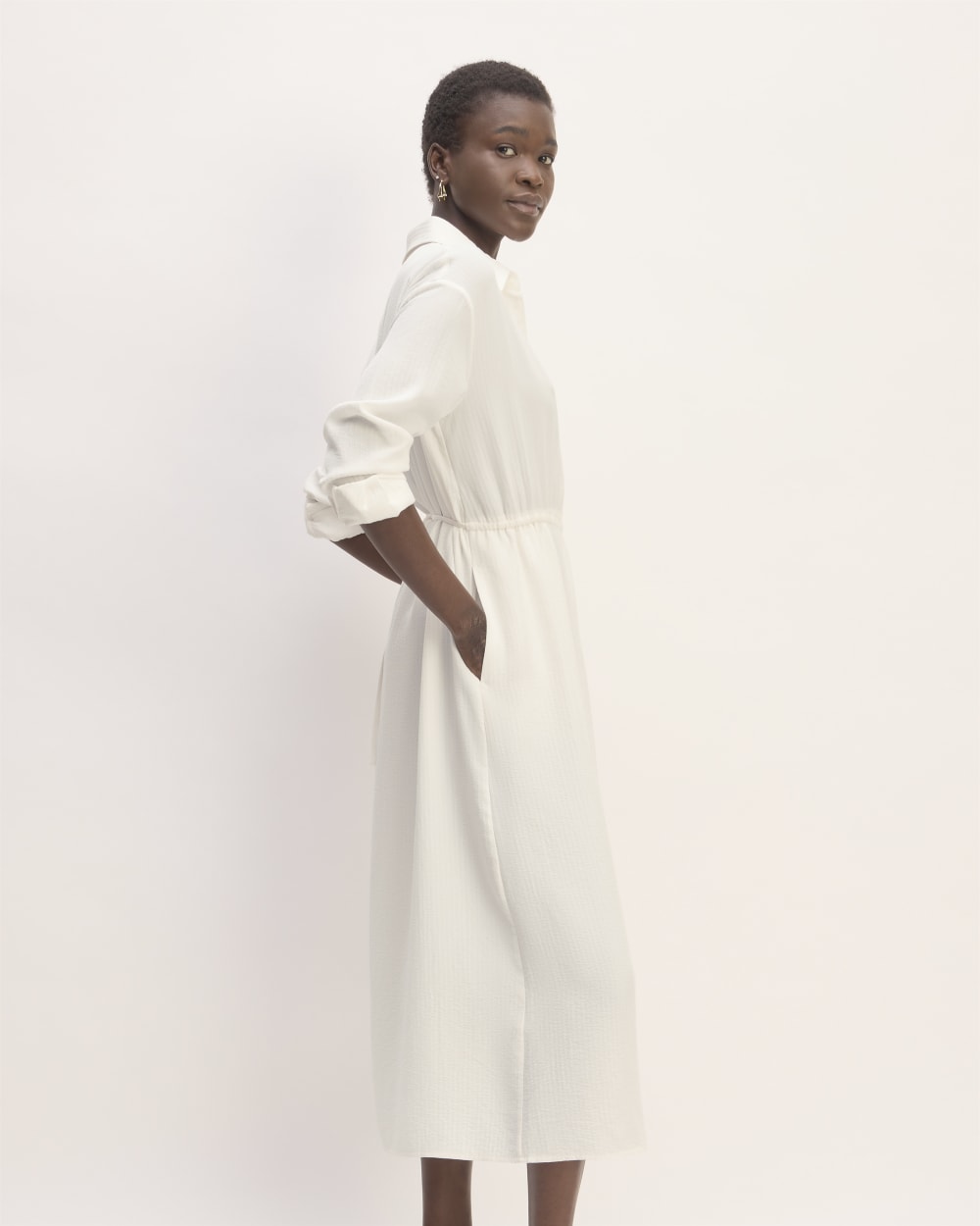 The Mini Jacquard Stripe Shirt Dress in Bone — detail view
