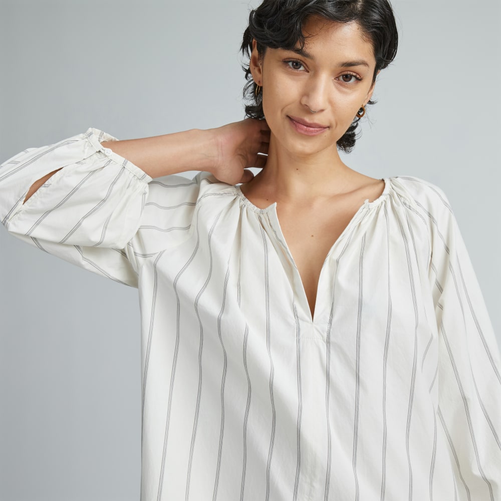 The Raglan Sleeve Poplin Dress in Black / Canvas Tan — detail view