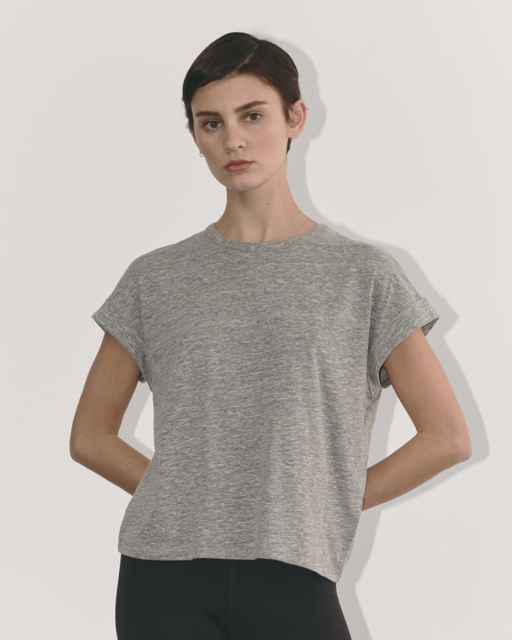The Perform Tee in Heathered Grey — front view