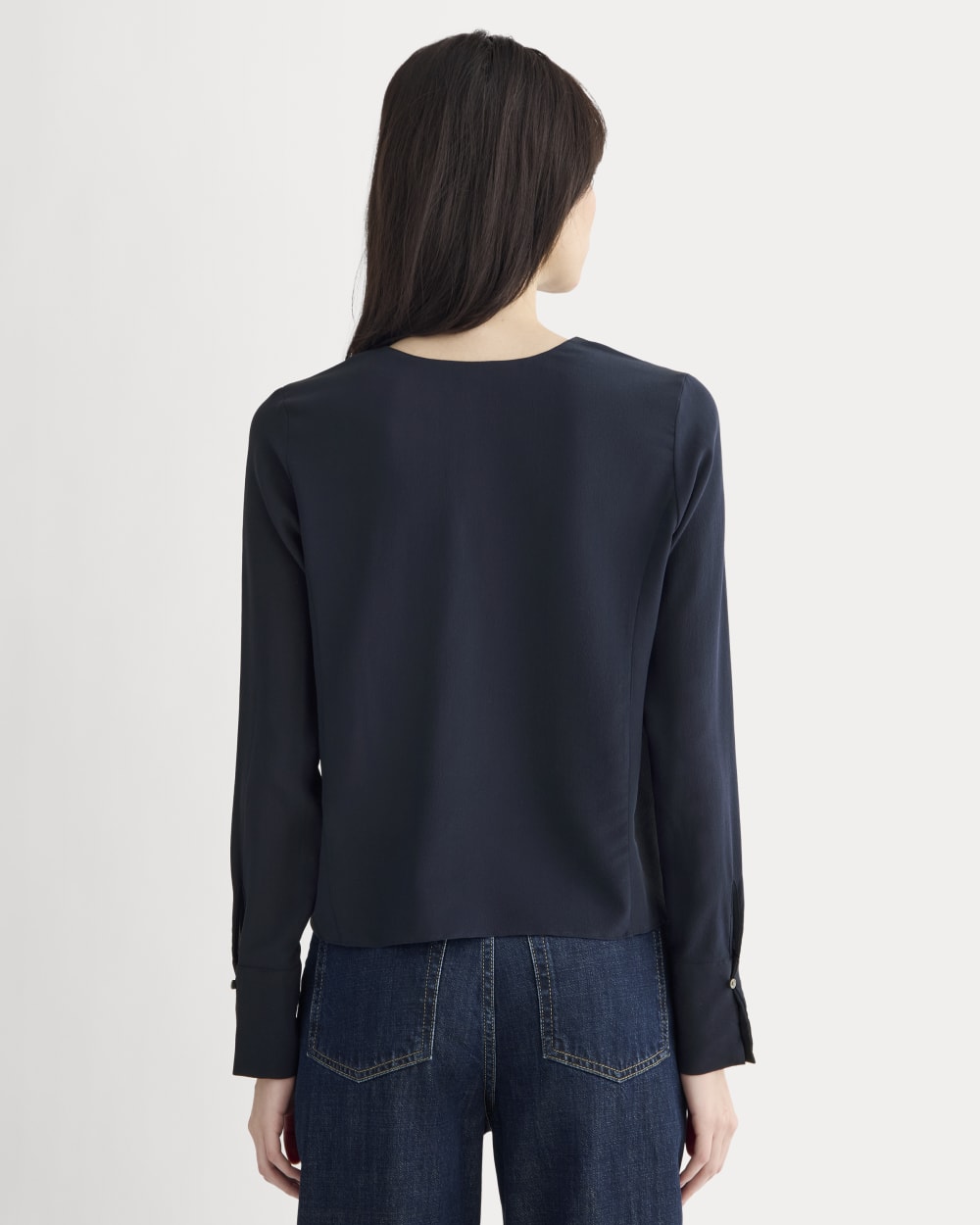 The V-Neck Blouse in Washable Silk in Navy — detail view