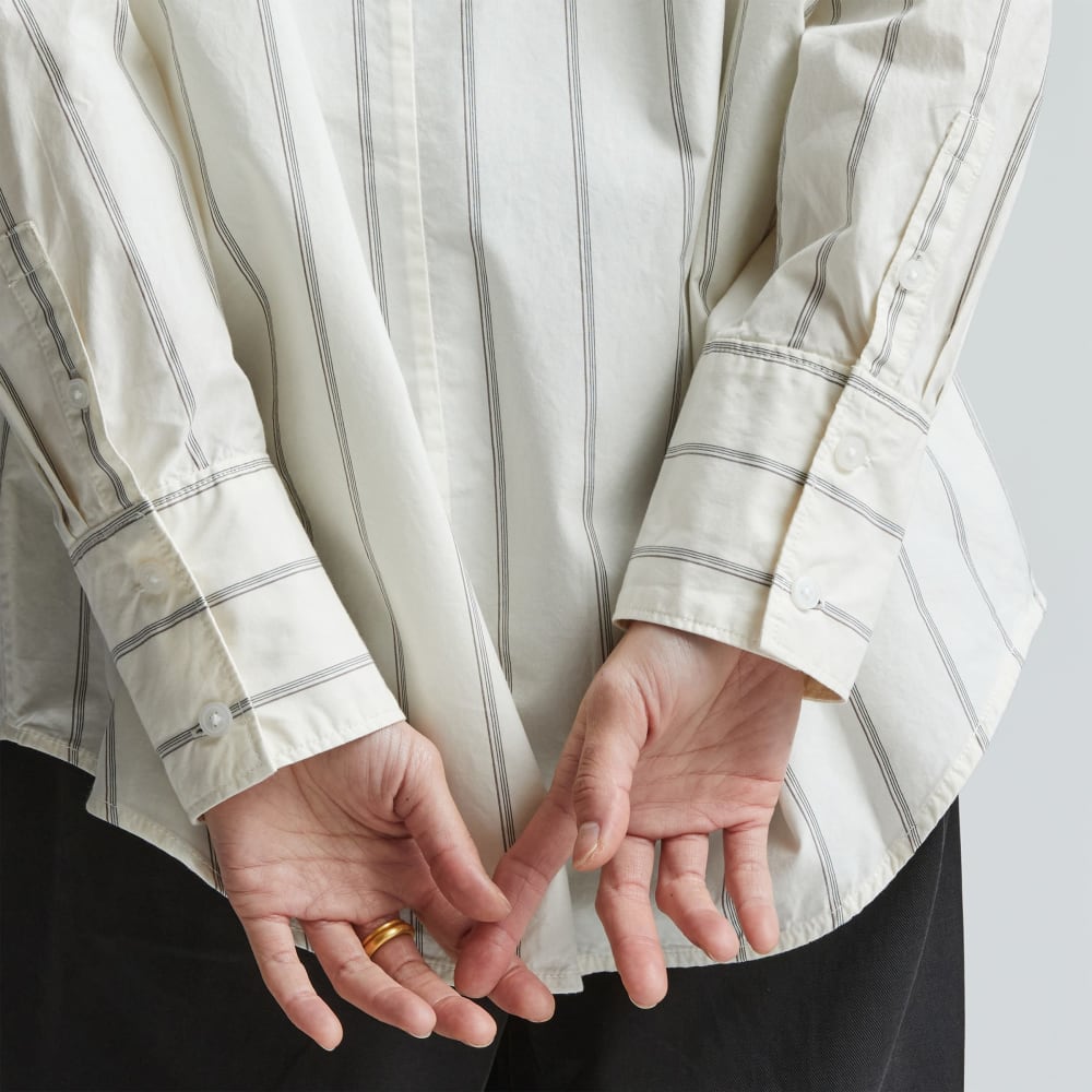 The Oversized Poplin Shirt in Black / Canvas Tan — detail view