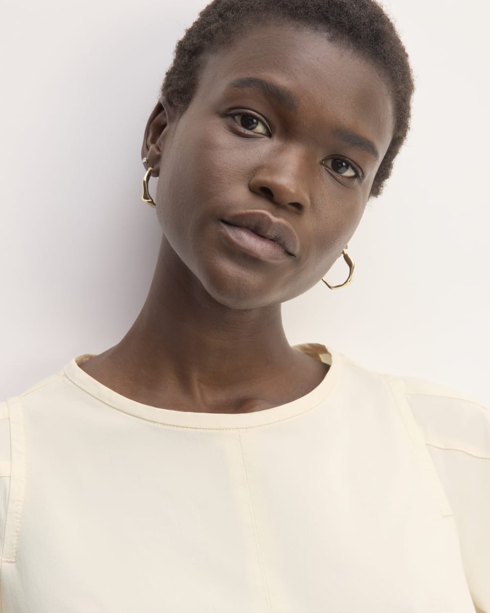 The Short-Sleeve Puff Midi Dress in Bone — detail view
