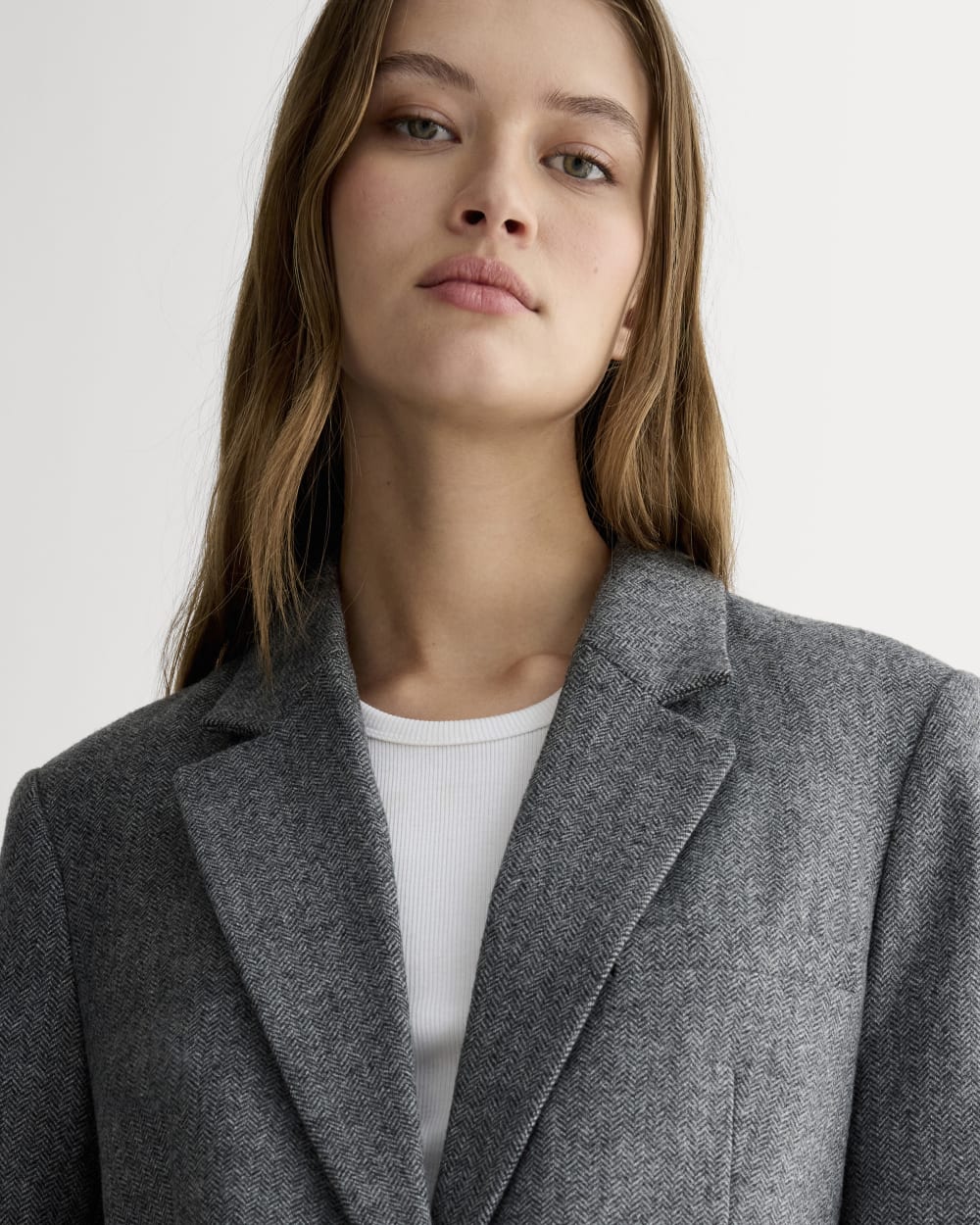 The Oversized Blazer in Wool in Grey Herringbone — detail view