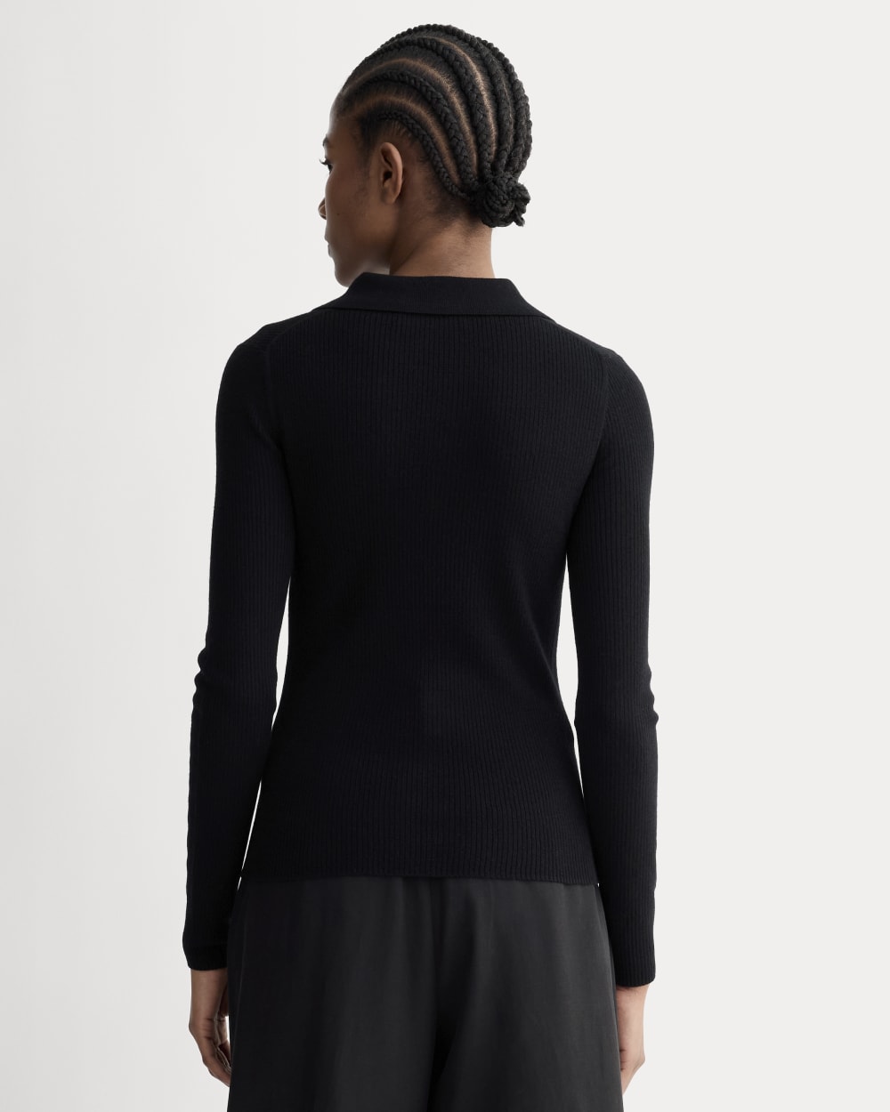 The Polo in Ultrasoft Merino in Black — detail view