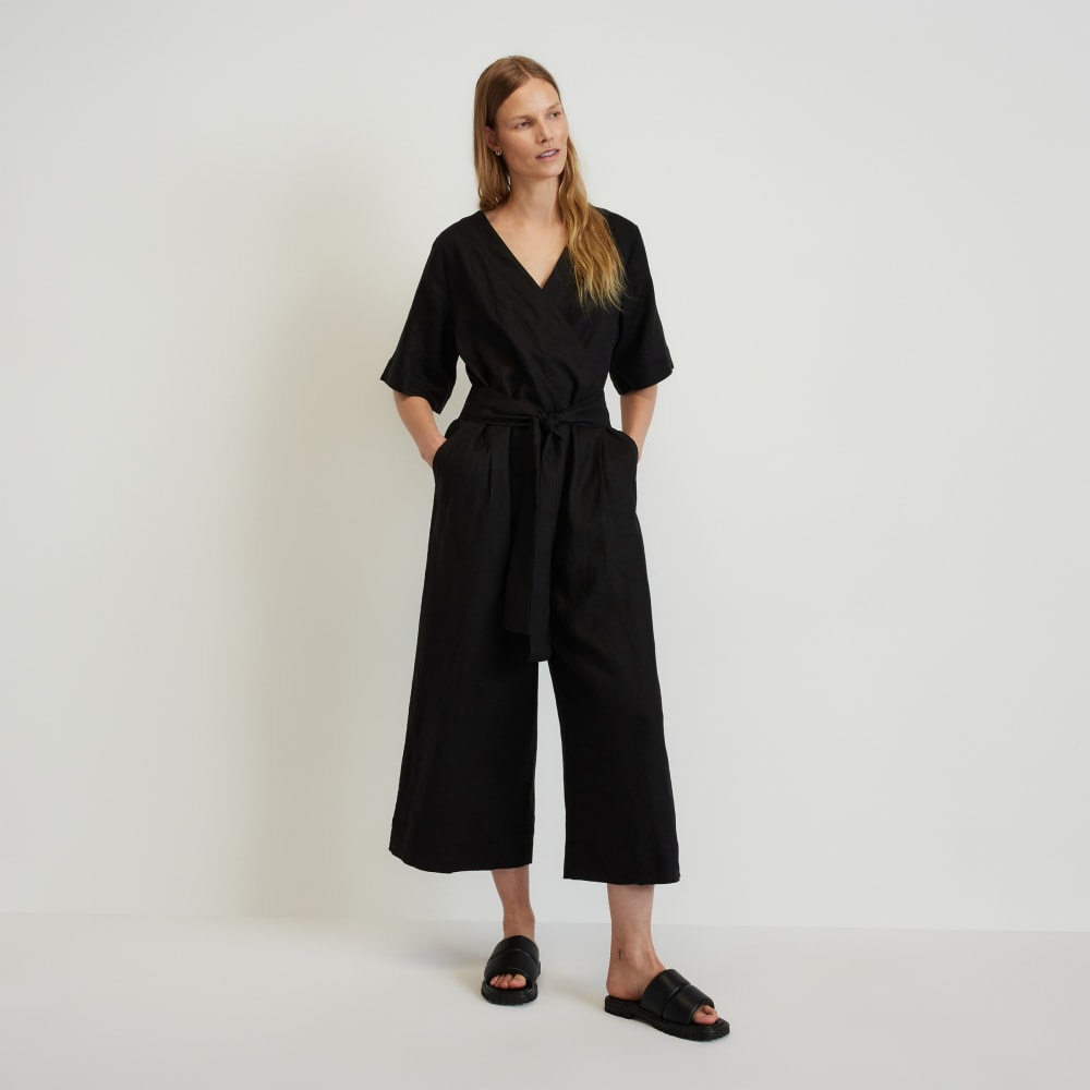 The Wrap Jumpsuit in Linen in Black — front view