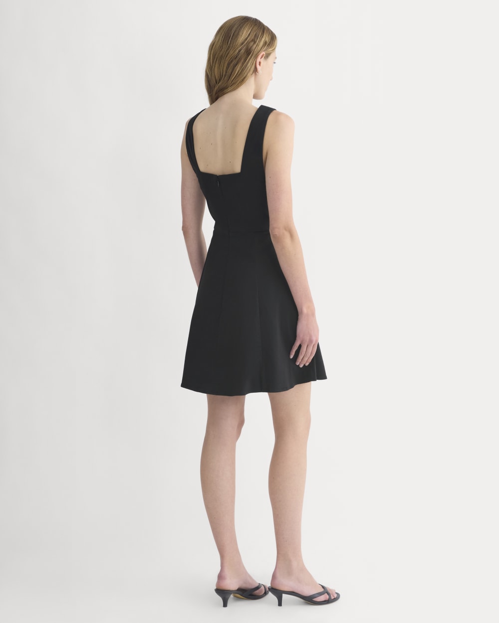 Seamed Open-Back Mini Dress in Black — detail view