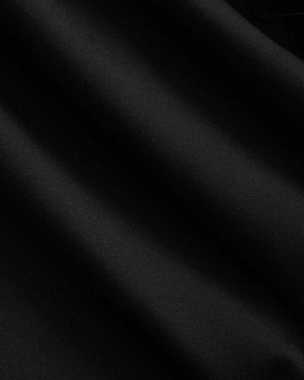 Ponte V-Neck Mini Dress in Black — detail view