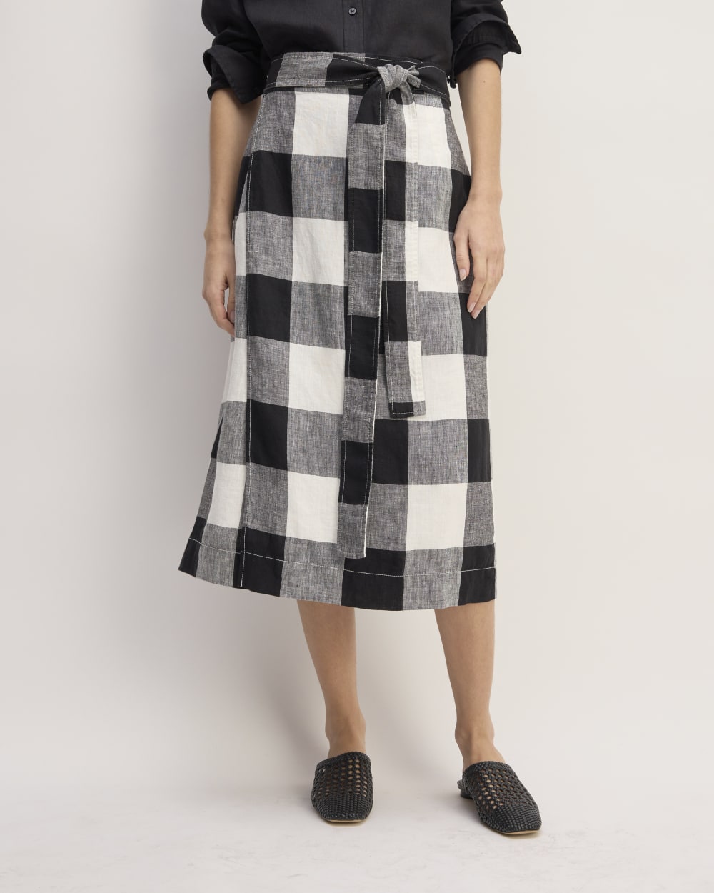 The Linen Wrap Skirt in Bone / Black Check — detail view