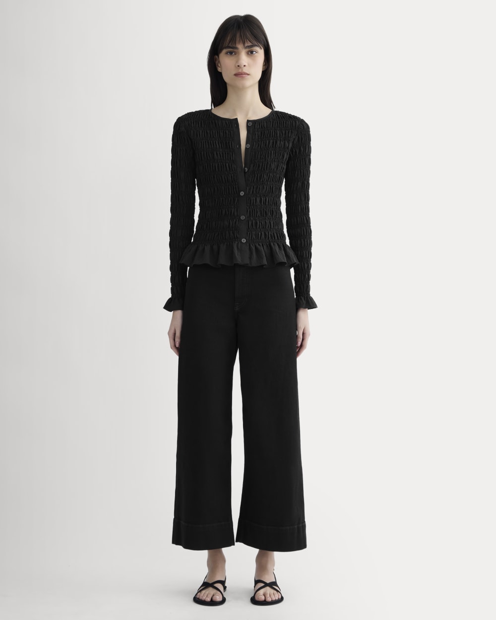 The Smocked Cardigan in Black — detail view