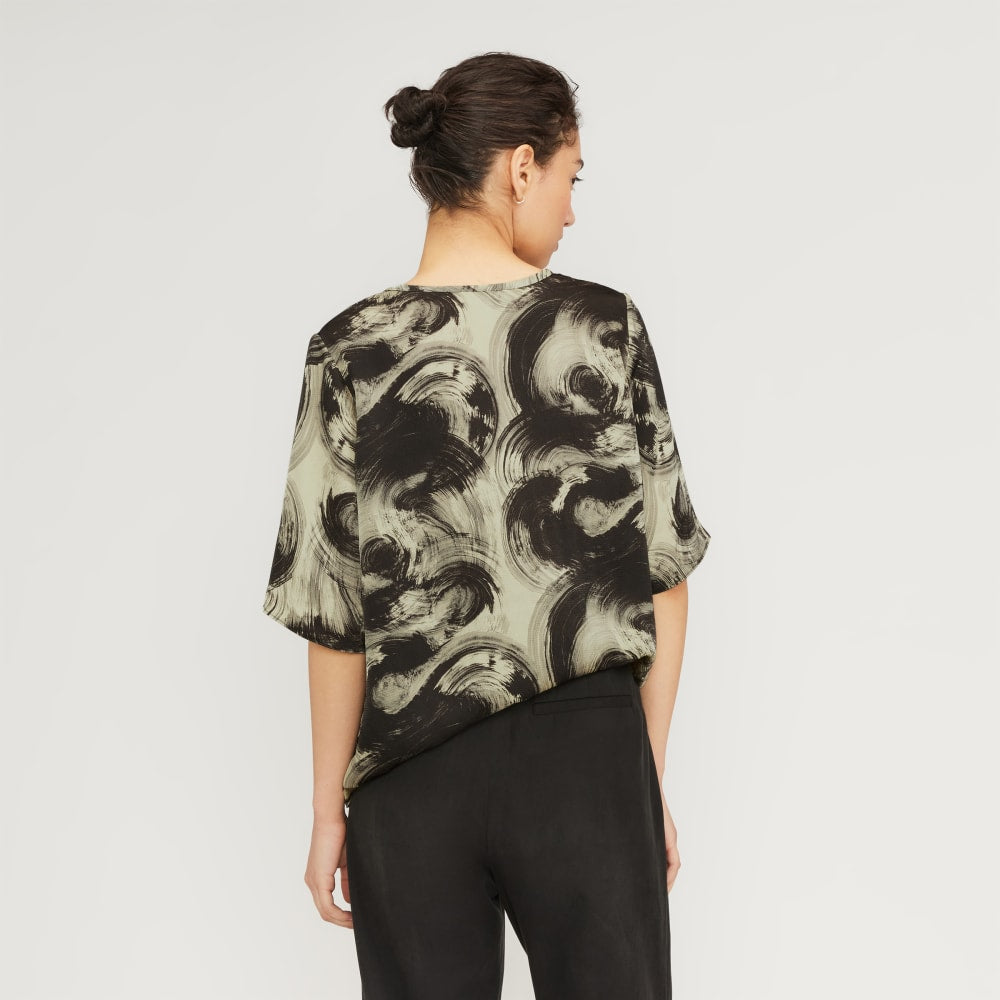 The Satin Relaxed Tee in Pale Yellow / Black — detail view