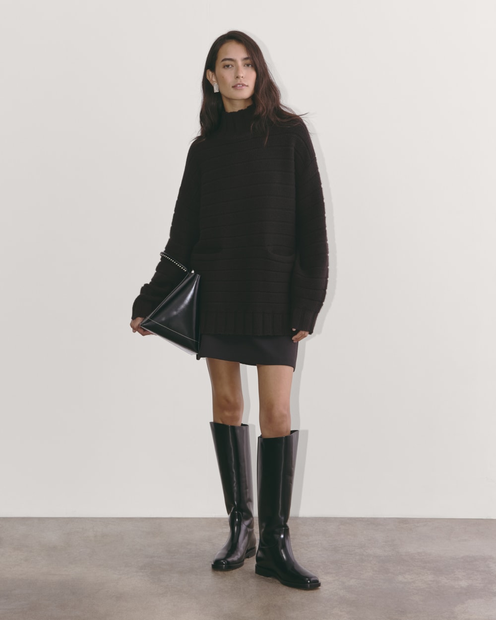 The Oversized Turtleneck in Luxe Merino in Black — detail view