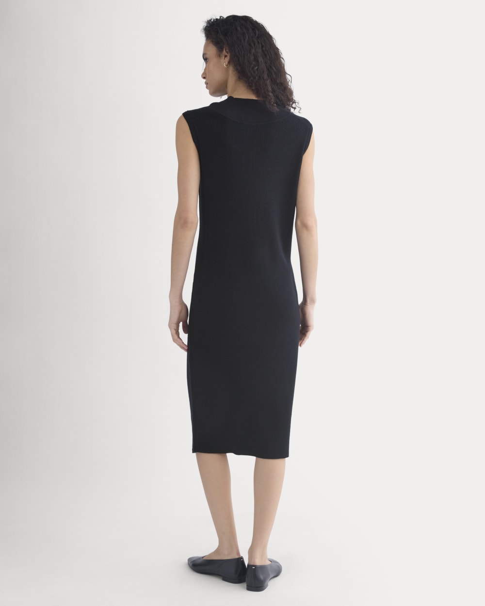 Relaxed V-Neck Midi Sweater Dress in Cotton Merino in Black — detail view