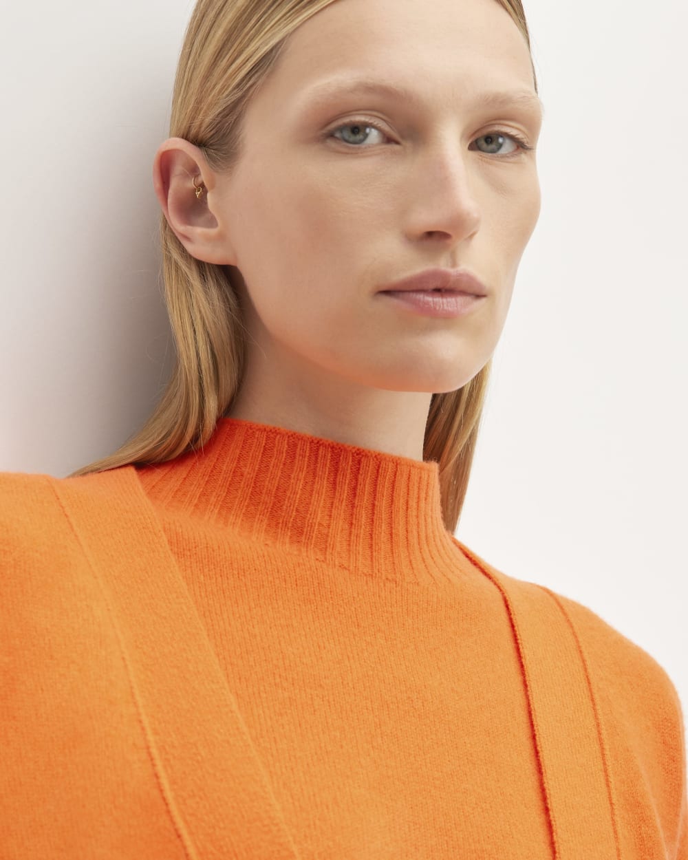 The Good Merino Wool Cardigan in Orange — detail view