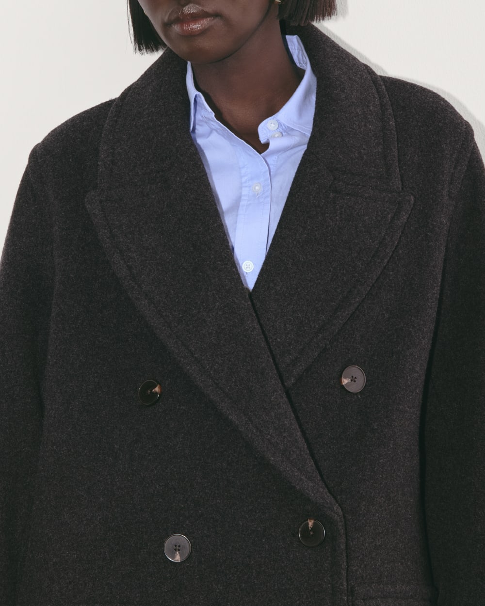 The Double-Breasted Coat in Wool in Heather Charcoal — detail view