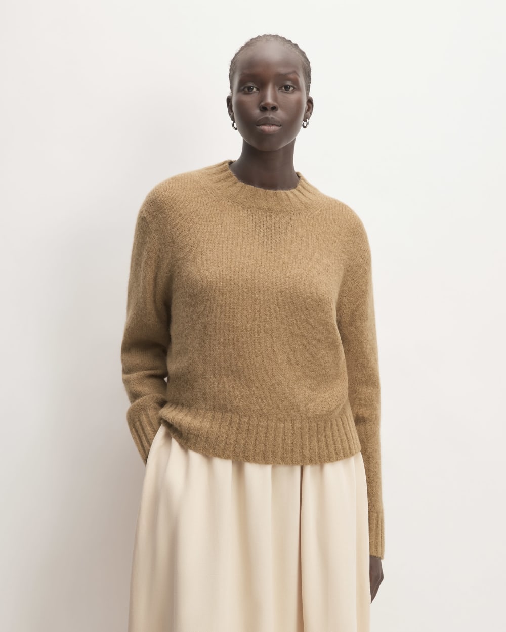 The Alpaca Cropped Crewneck Sweater in Tiger's Eye — front view