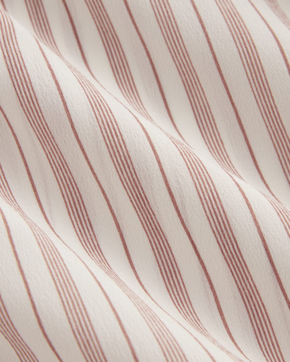 The Notch Shirt in Washable Silk in Bone / Dusky Rose — detail view