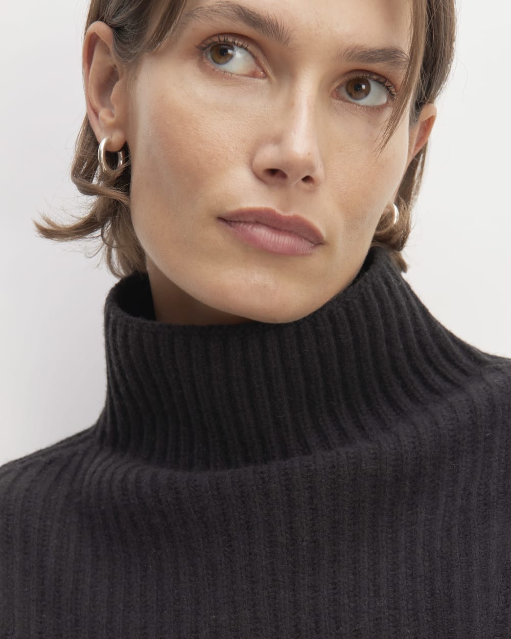 The Felted Merino Funnel-Neck Pullover in Black — detail view