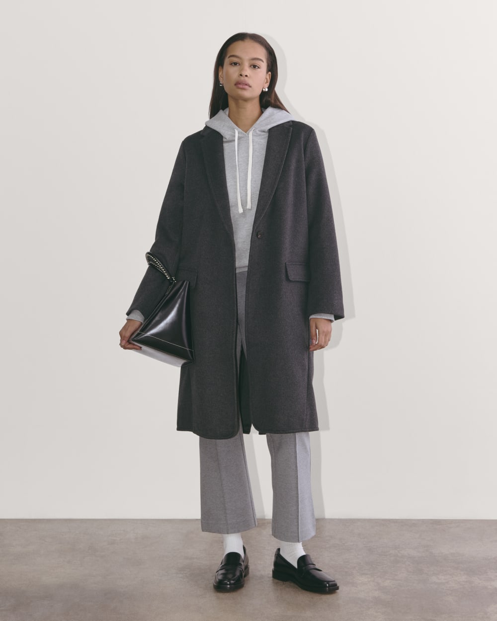 The Topcoat in Wool in Dark Charcoal Melange — front view
