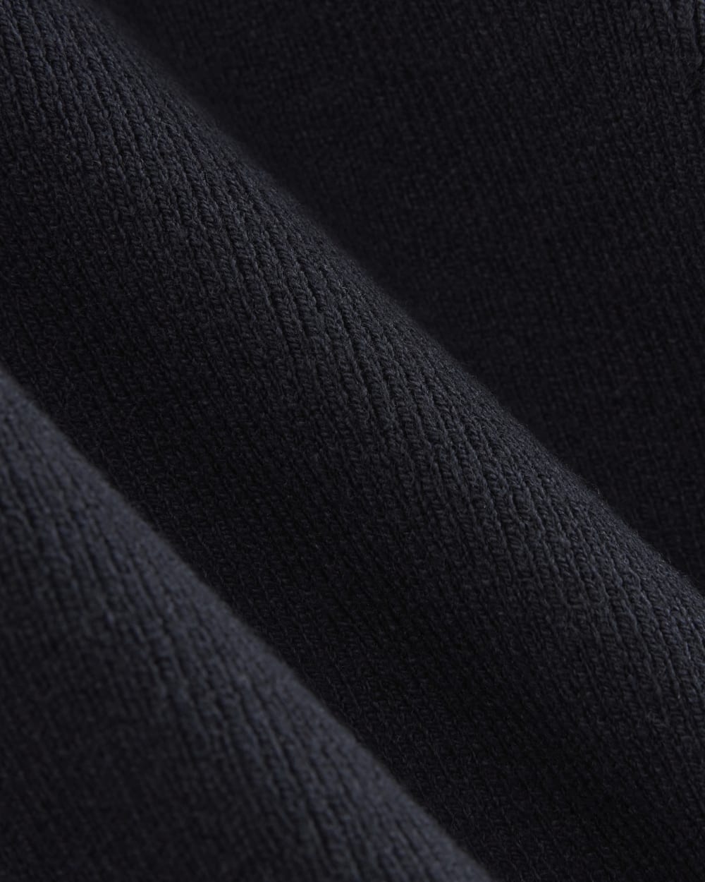 The Knit Polo in Navy — detail view