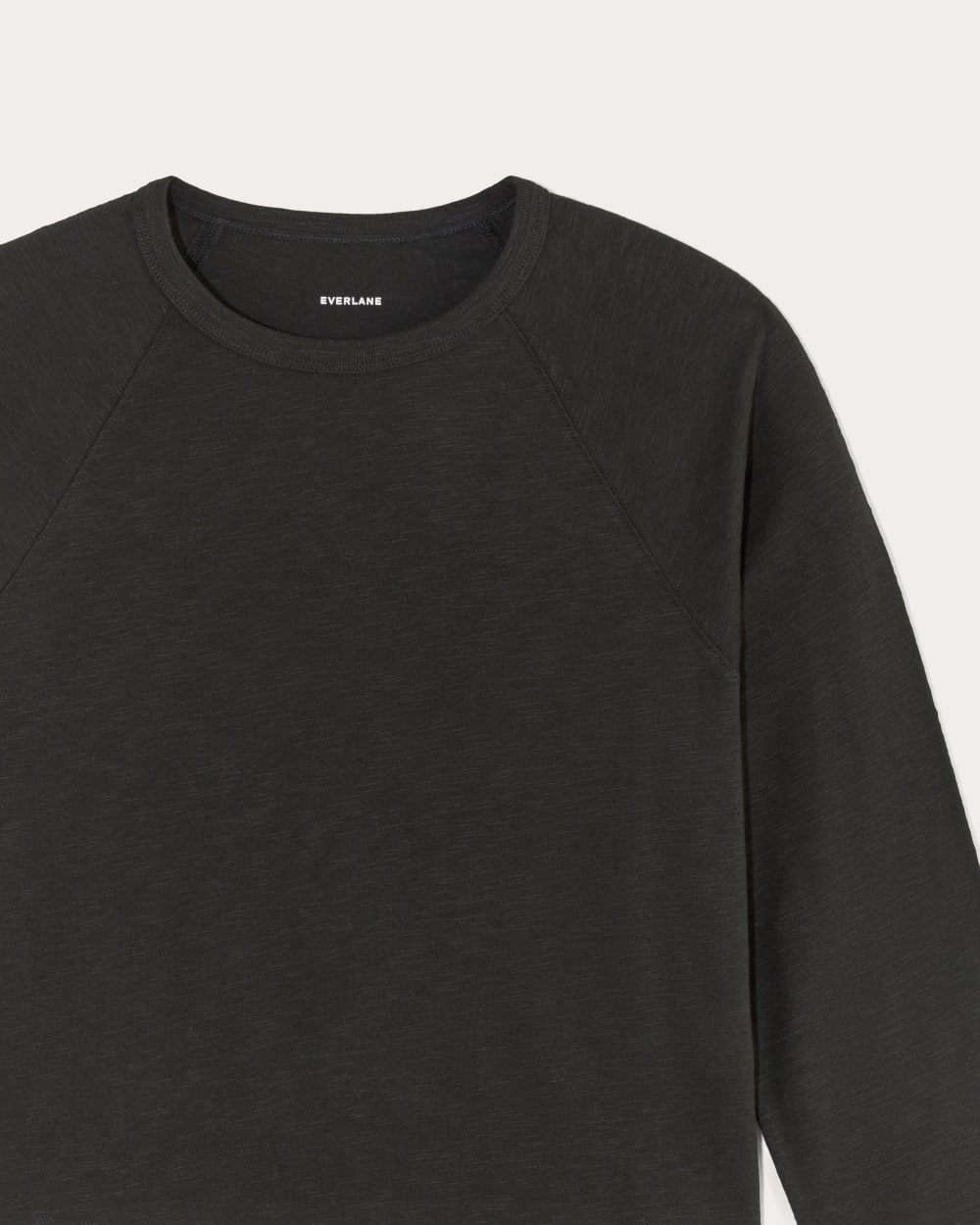The Perform Crew Tee in Black — detail view