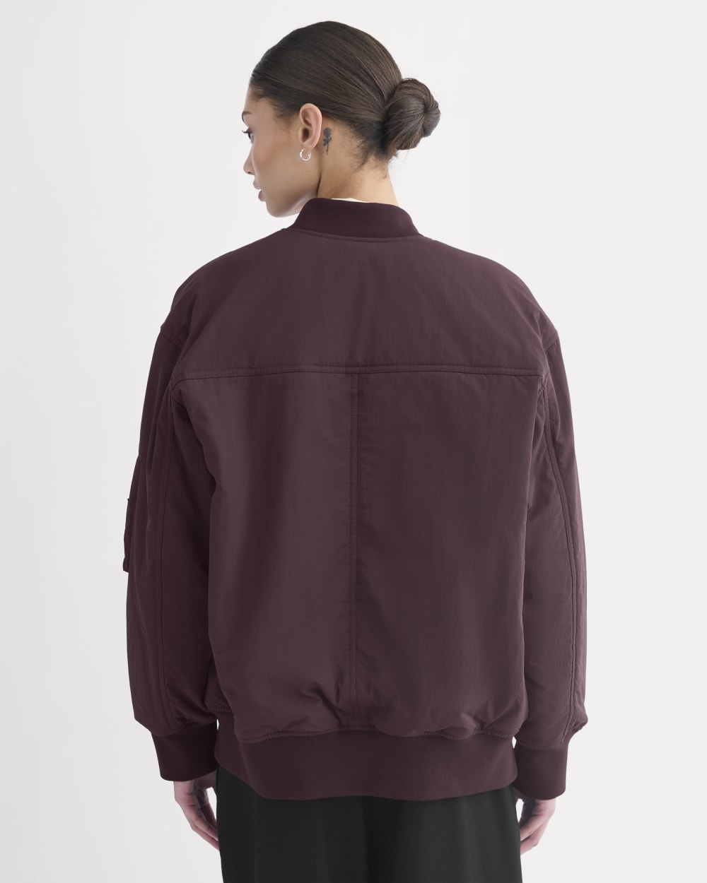 Renew Oversized Puffer Bomber in Deep Plum — detail view