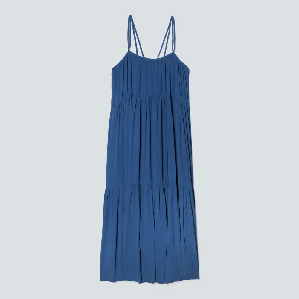 The Naia™ Ripple Tiered Maxi Dress in Deep Blue — front view