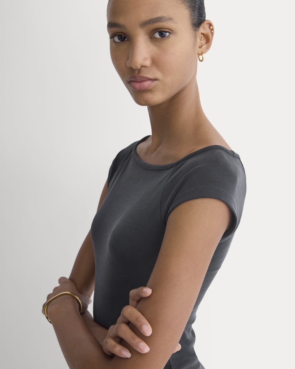 Boatneck Cap-Sleeve Top in Butterknit in Black — detail view