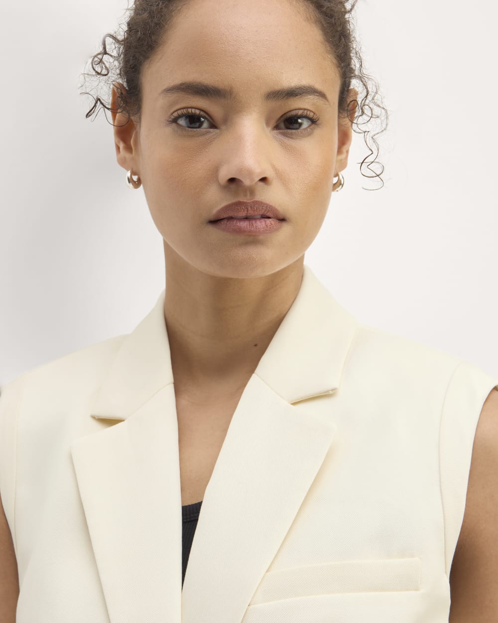 The Sleeveless Blazer in Buttersmooth in Canvas — detail view