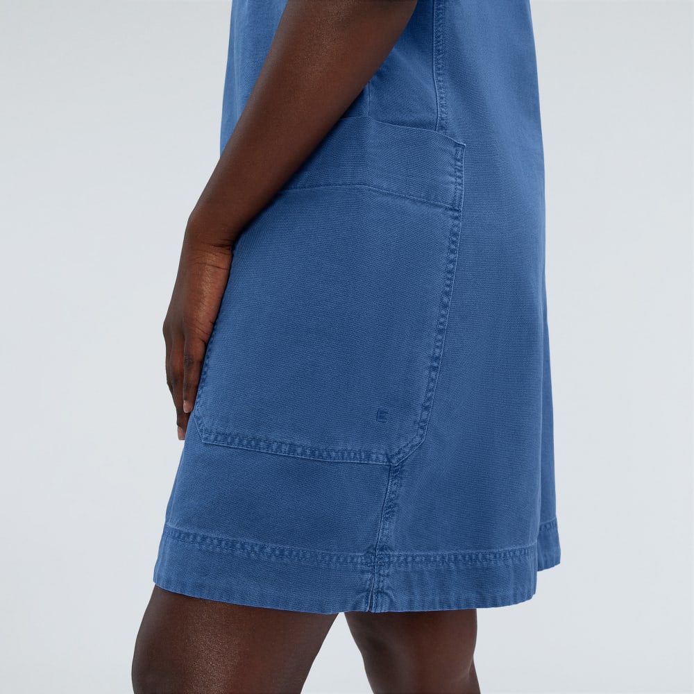 The Cross-Back Apron Mini Dress in Deep Blue — detail view