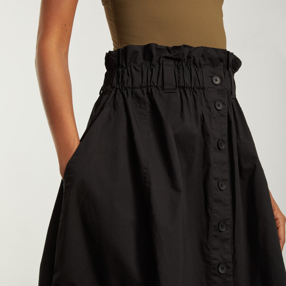 The Easy Button-Front Skirt in Black — detail view