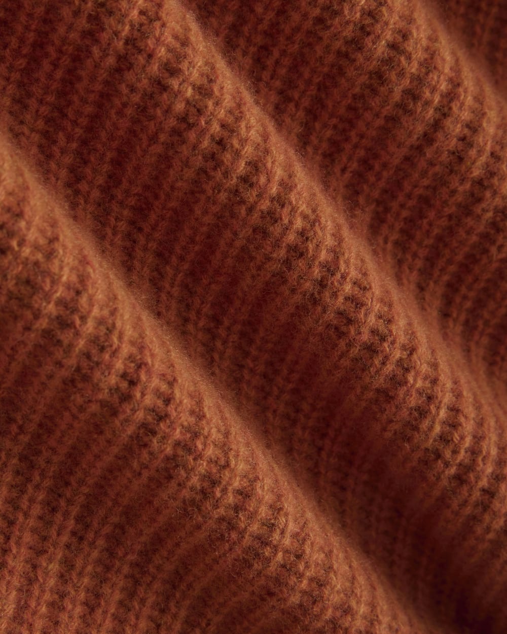 The Half-Zip Sweater in Luxe Merino in Rust Heather — detail view
