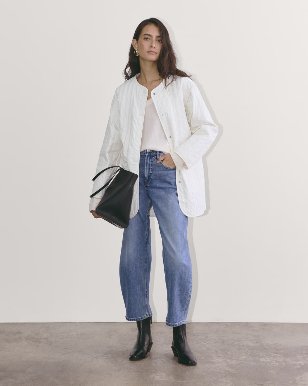 The Midi Quilted Liner in Bone — detail view